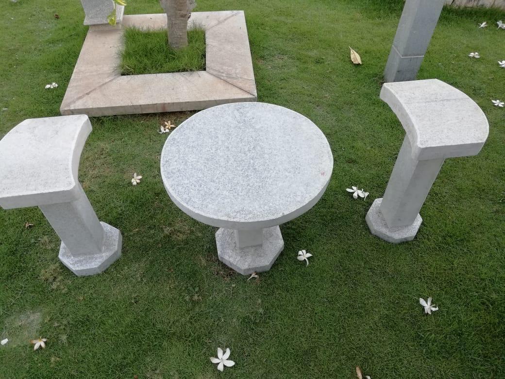 round stone patio table