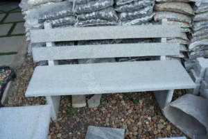 white stone garden bench
