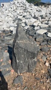 monolithic black landscape feature boulder