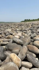 smooth river pebble pond setting balls